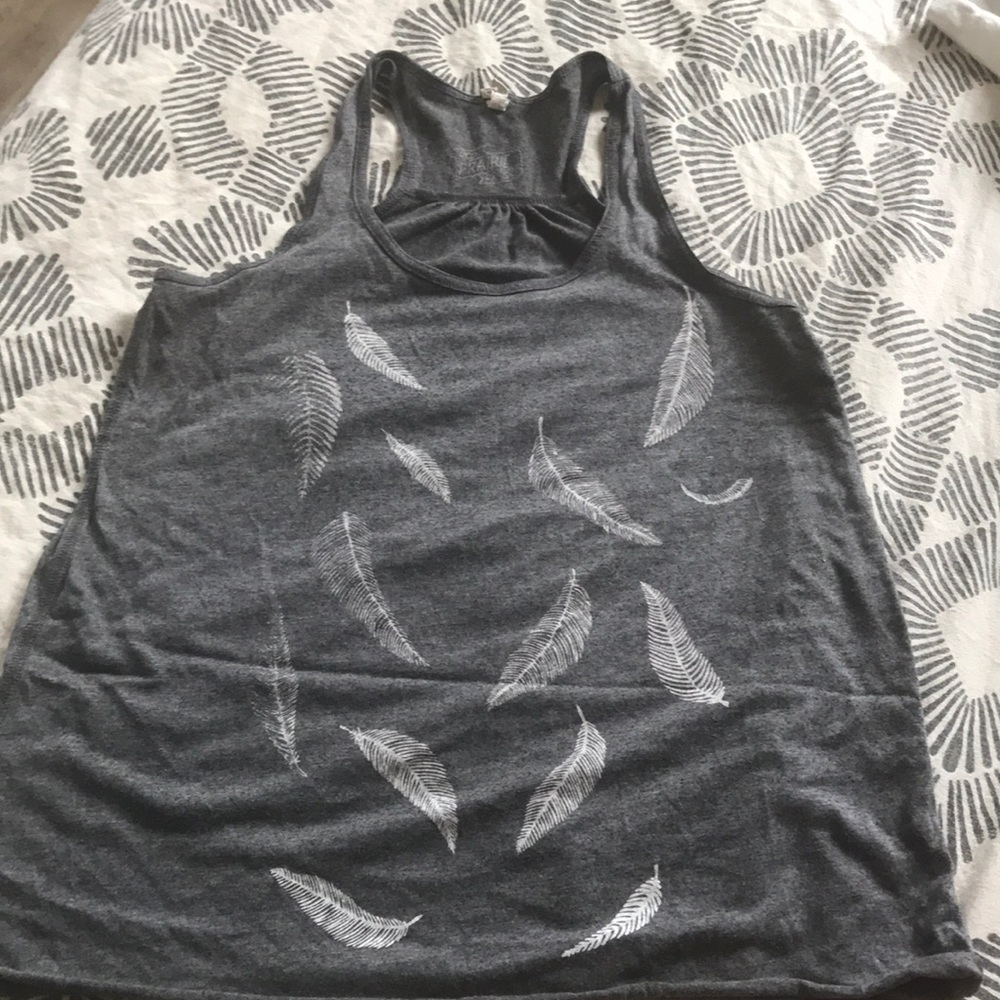 Red prairie press tank with feathers.